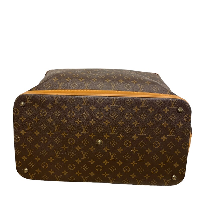 Vintage Louis Vuitton Monogram Cruiser 45 Travel Tote  Signature monogram canvas exterior trimmed with tan leather and golden brass hardware. This is a rare vintage design from Louis Vuitton. It's not longer made or sold in stores. Very unique top folding buckle and zip closure which opens to brown canvas lined interior with one side slit pocket and ample storage space for all kinds of belongings<br />
Dimesions: Length: 19.75<br />
Height: 13<br />
Depth: 11<br />
Strap Drop: 4.5