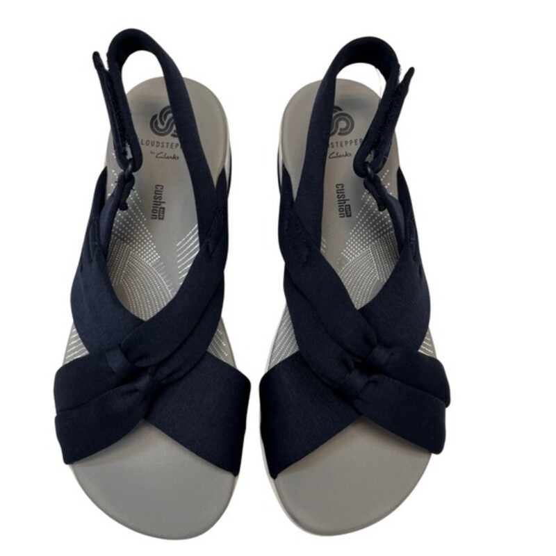 NEW Cloudsteppers by Clark Arla Belle Sandals
Color: Navy
Size: 5.5
Flexible crisscross straps with knotted detail, adjustable hook-and-loop backstrap
Padded insole, EVA midsole, textured outsole
Bottom construction: Arla
Approximately 1-5/8H heel
Fit: true to size
Fabric upper; man-made balance