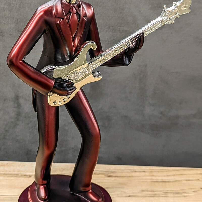 Modern Guitar Player Figurine
Maroon Black Silver Size: 7 x 12H