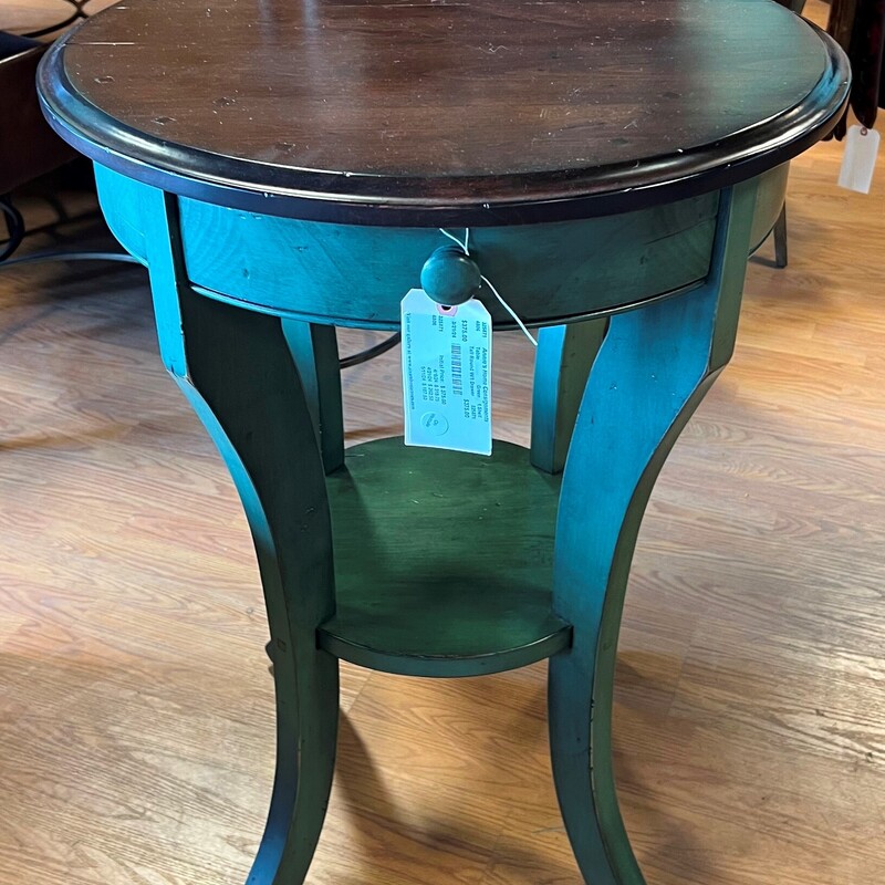 Tall Round Table With 1 Drawer
Green, 1 Shelf
24in(W) 32in(D) 33.5in(H)