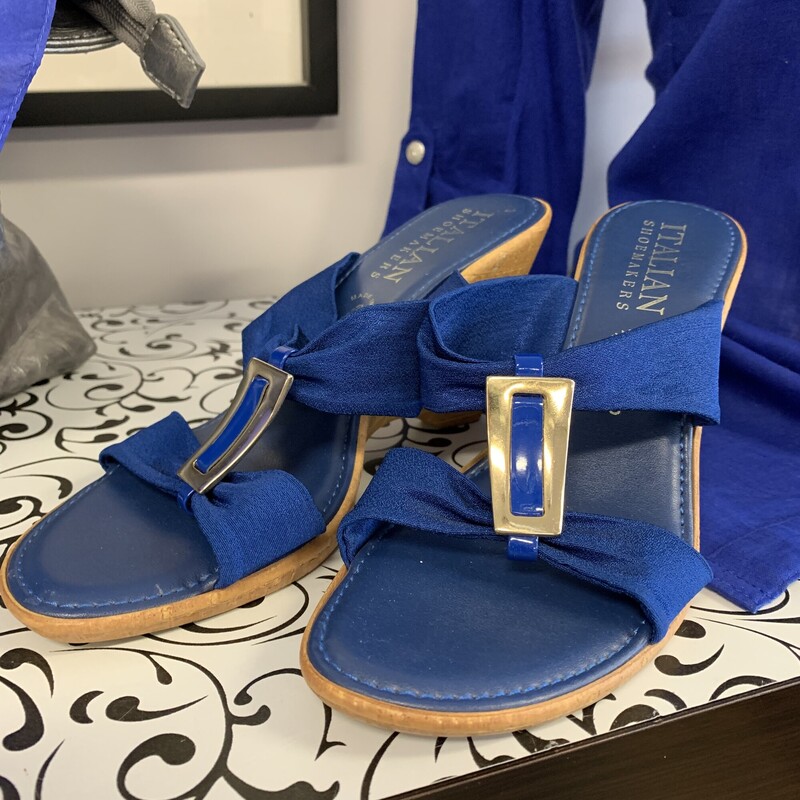 Italian Shoemakers Wedge slide on,
Colour: Blue,
Size: 9
