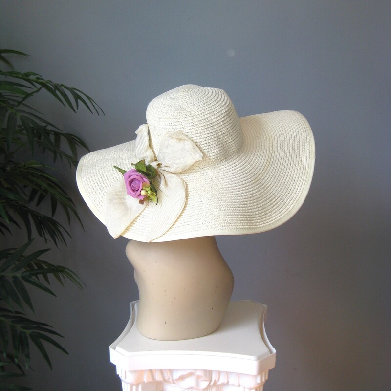 Perfect for a summer special ocassion, a visit to the track or a special Sunday Church event<br />
this is a brand new with tags organza hat by Josette<br />
It's ivory or cream, with a wide brim tiers of ribbons around the crown and finished with a fancy bow<br />
So lightweight and easy to keep on the head<br />
Crisp and sturdy.<br />
<br />
the inside circumference is 22.<br />
<br />
perfect brand new condition.<br />
Thanks for looking!<br />
#70972