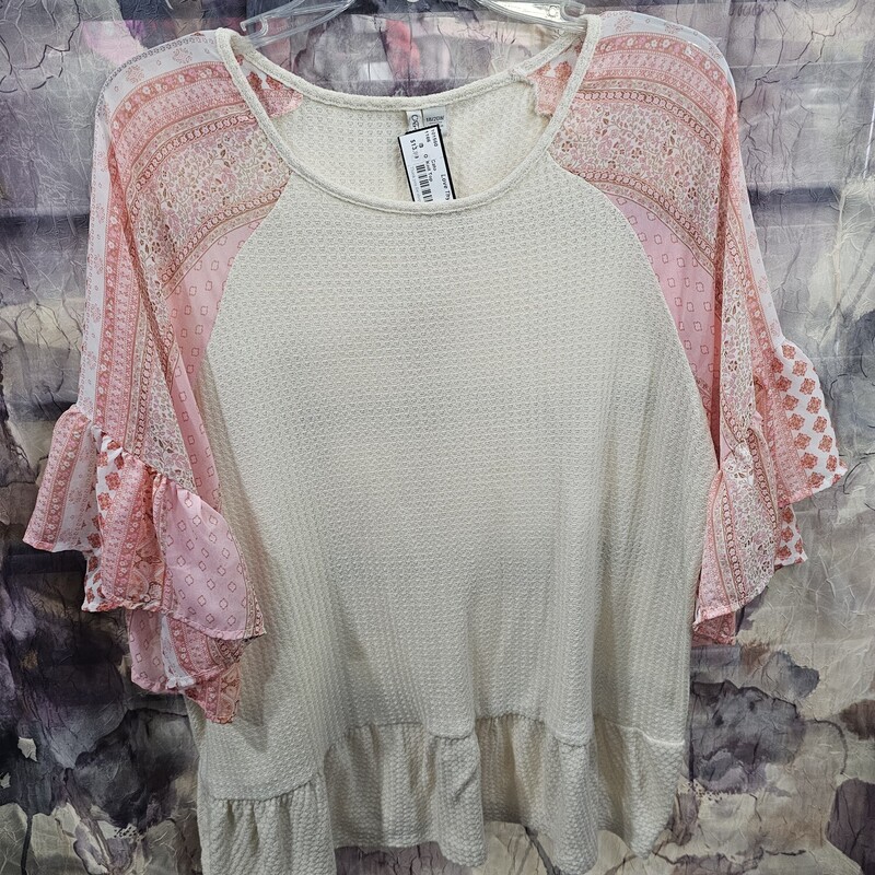 Super cute waffle materialed beige top with flowy boho style pink printed sleeves.