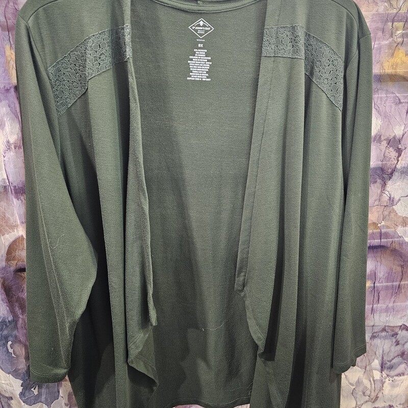 Long sleeve super soft light weight knit cardigan style top in olive green.