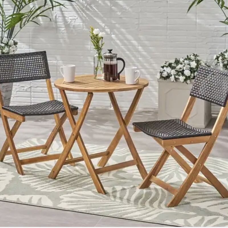 Hillside Acacia Bistro

Table:  26Wx26Dx29H
Chairs:  18Wx21Dx34H

Furnish your outdoor space with an organic touch by simply bringing home an addition of these Christopher Knight Home Hillside Acacia Wood Foldable Bistro Chairs ( Set of 2). This foldable option not only provides compact convenience but also features a stunning woven look that instantly upgrades any existing décor. Constructed with acacia wood, this set offers reliable durability that naturally withstands most weather conditions. Its seating is finished with traditional hole-to-hole wicker caning that provides these Christopher Knight Home Hillside Acacia Wood Foldable Bistro Chairs with impeccable comfort and style that will last you for many years to come.