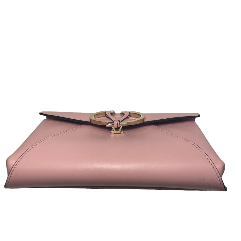 Valentino Leather Rivet Clutch Pink<br />
<br />
Size: OS<br />
<br />
Missing strap and light scuffs on handbag.<br />
<br />
Dimensions:<br />
Base length: 10 in<br />
Height: 6.75 in<br />
Width: 1.5 in<br />
Drop: 17.5 in