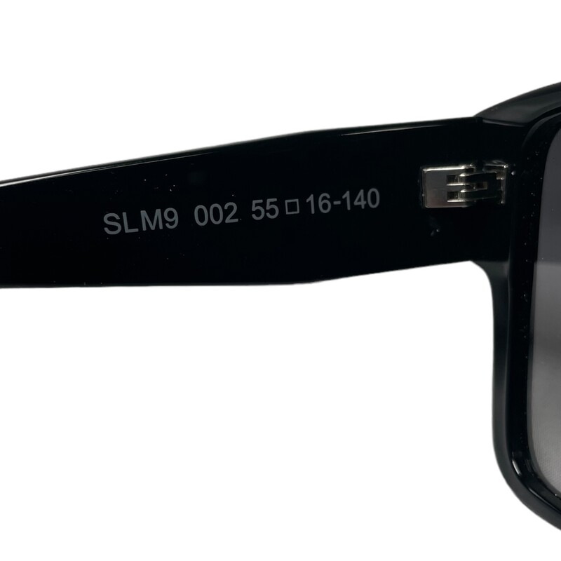 YSL Oversized 55mm Black Size: SLM9

Dimenions:
Lens: 55mm wide
Bridge: 16mm wide
Arms: 140mm long

Frame shape: oversized
Frame color: black
Lens color: grey
Plastic lenses with 100% UV protection