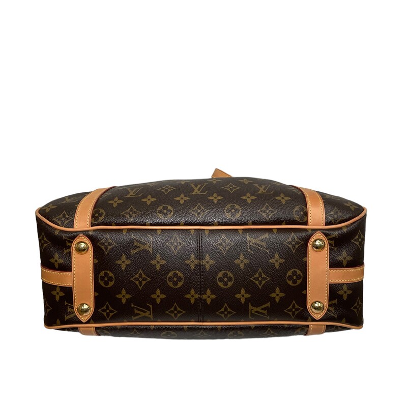 LOUIS VUITTON Monogram Stresa PM. This chic shoulder bag is beautifully crafted of classic Louis Vuitton monogram on toile canvas. The shoulder bag features vachetta cowhide leather shoulder straps and trims with polished brass hardware including a front press lock and protective feet on the bottom. The top zipper opens to a cocoa brown fabric interior with patch pockets.<br />
<br />
Dimensions:<br />
Base length: 15.5 in<br />
Height: 10 in<br />
Width: 5.75 in<br />
Drop: 8.5 in