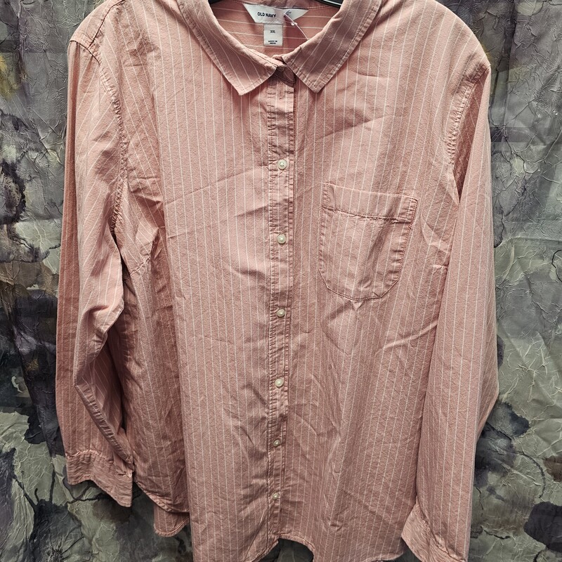 Button up blouse in pink and white stripe.