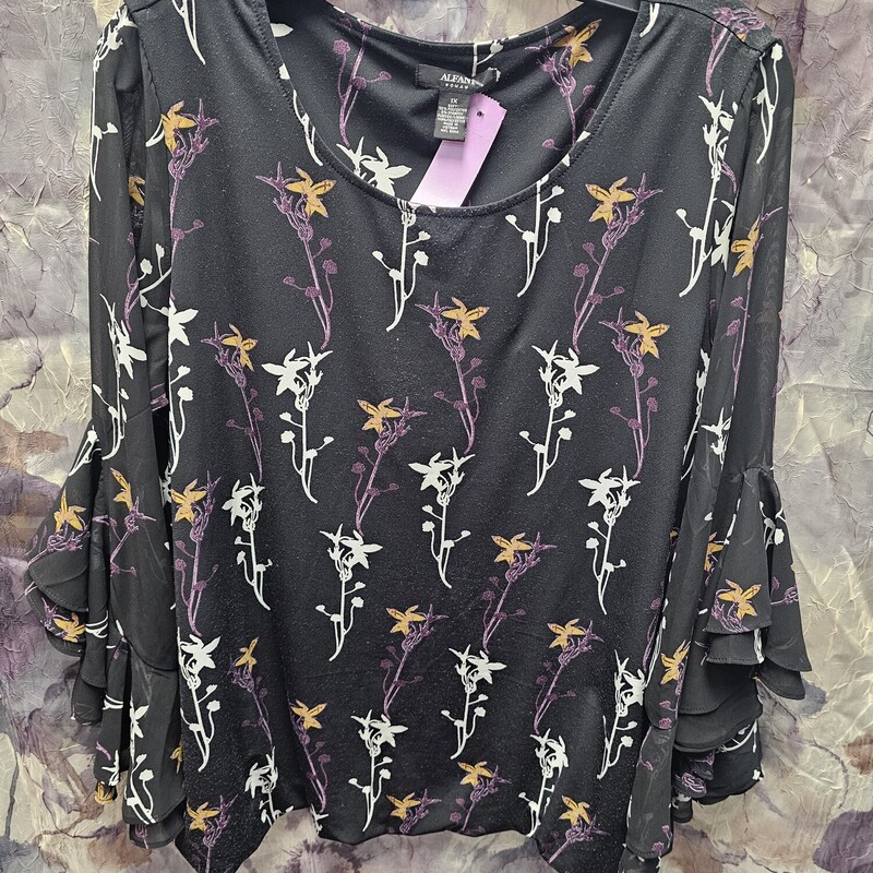Black blouse with three quarter sleeves and a great print.
