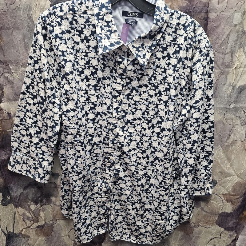 Half sleeve button up in blue and white floral print.