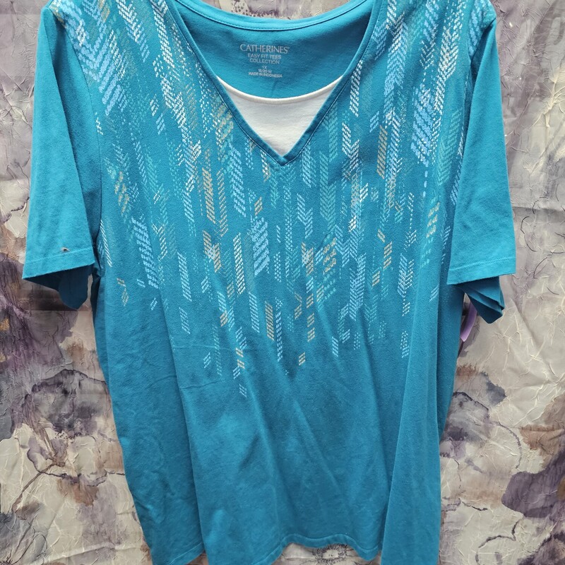 Short sleeve tee in teal with graphic and tank insert for cleavage coverage.