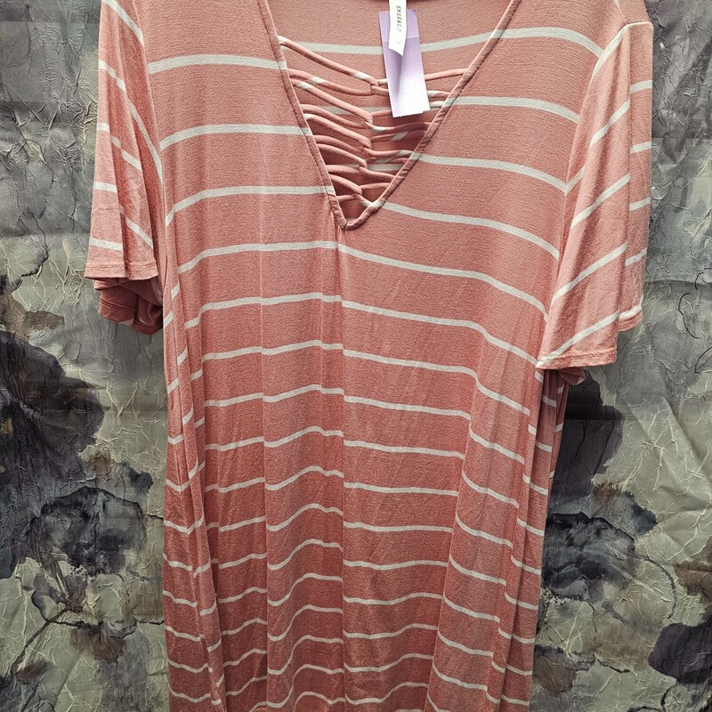 Short sleeve tee in pink and white stripe. Longer cut.