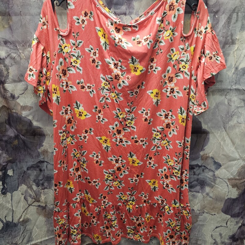 Short sleeve longer fit and cold shoulder knit top in a pink/orange color with floral design. Brand new with tags.