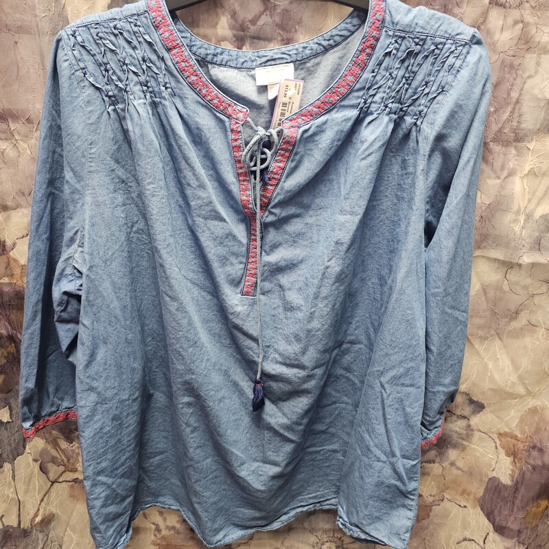 Half sleeve blouse in a denim blue with red trims