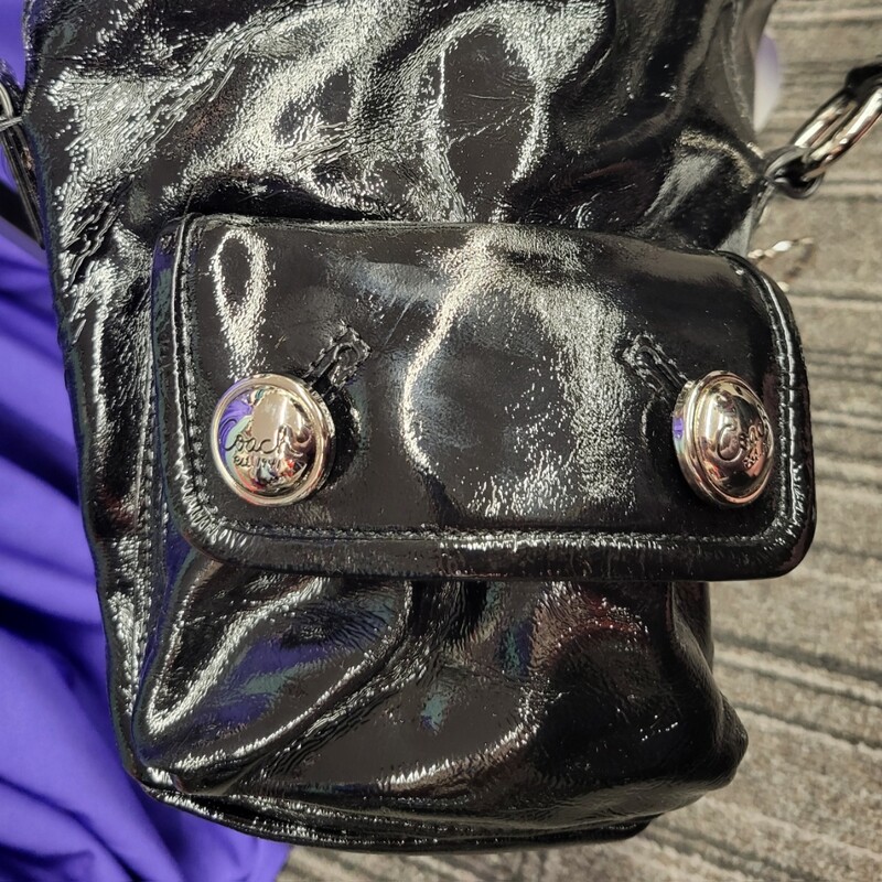 Brand NEW condition Coach Poppy Black Patent Leather Tote Bag & Wristlet Serial Number C0973-13832 Silver hardware, zipper top, 3 small interior pockets, 3 exterior pockets, 2 removable key chain tags, satin aqua interior, 14 x 11 with 3 strap drop