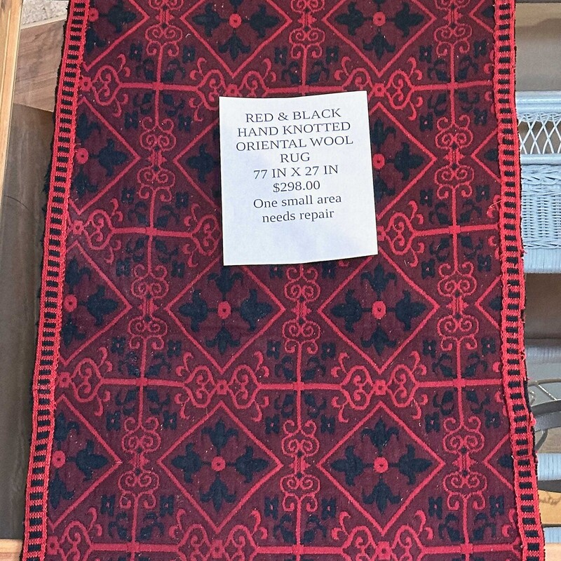 Red and Black Hand Knotted Wool
Oriental Rug
77 In x 27 In.
Note: One small area is pulled and needs to be sewn, but doesn't distract. It is pinned to ensure it doesn't pull.