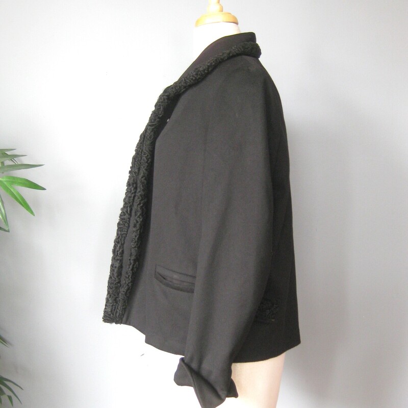 Vtg Wool P. Lamb Trim Cro, Black, Size: Medium<br />
Simple vintage 1950s cropped jacket<br />
It's made of wool felt and sports persian lamb trim at the collar and waist<br />
fully lined<br />
welted hip pockets<br />
cuffs are turned up but they can be turned down if desired.<br />
no closures - It has a button at the neck but the presumably elastic loop that allowed the jacket to be closed has disappeared.<br />
It's a nice litte piece to have in the wardrobe and it's in othewise excellent condition!<br />
I don't understand why but the label was sewn in upsidedown.  I've seen this one other time.  Not sure what it signifies.<br />
Here are the flat measurements, please double where appropriate.<br />
shoulder to shoulder: 15<br />
armpit to armpit: 24<br />
Length: 24<br />
width at hem: 22<br />
underarm sleeve seam length: 18.5<br />
<br />
Thanks for looking!<br />
#63508