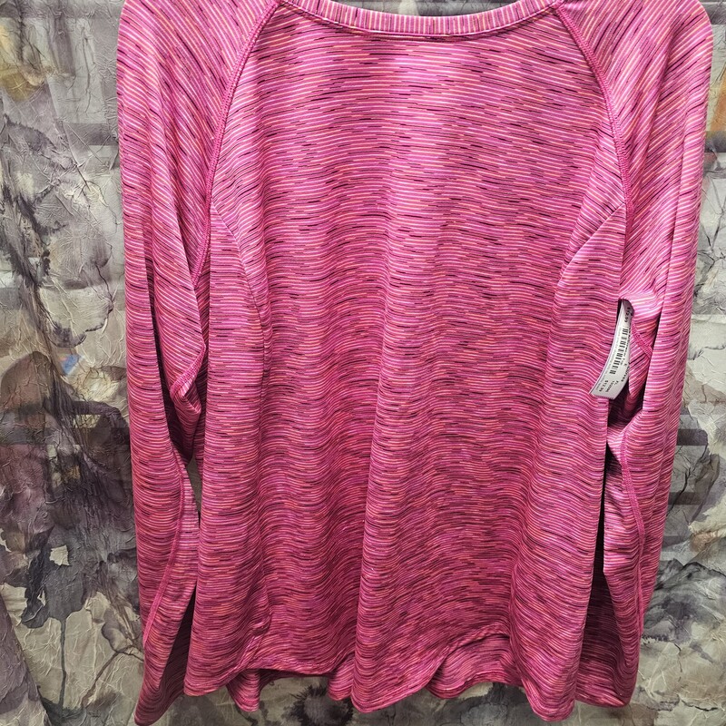 Long sleeve activewear top in pink with multi colored stripe pattern
