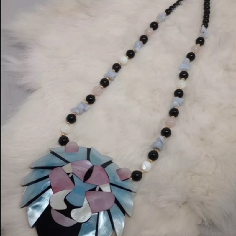 Lee Sands Exotic Lion Necklace
Blue Pink Black White Size: 22L