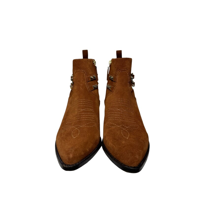 Valentino Double Buckle Brown Boots<br />
<br />
Size: 39.5<br />
Heel: 2.00 in<br />
<br />
This is an authentic pair of Valentino Suede Rockstud Cowboy Ankle Bootsin Tan. These chic ankle boots are crafted of camel brown suede leather. The boots feature adjustable ankle straps lined with Valentino's signature polished light gold pyramid studs, a 2-inch tapered block heel, and a pointed toe. These are excellent boots for sturdy wear from Valentino!