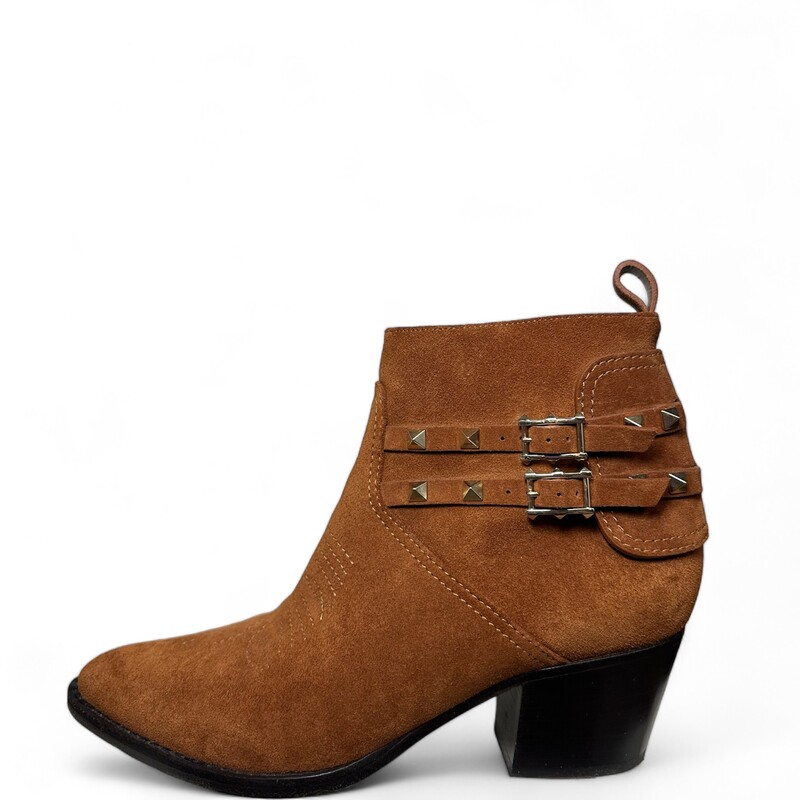 Valentino Double Buckle Brown Boots

Size: 39.5
Heel: 2.00 in

This is an authentic pair of Valentino Suede Rockstud Cowboy Ankle Bootsin Tan. These chic ankle boots are crafted of camel brown suede leather. The boots feature adjustable ankle straps lined with Valentino's signature polished light gold pyramid studs, a 2-inch tapered block heel, and a pointed toe. These are excellent boots for sturdy wear from Valentino!