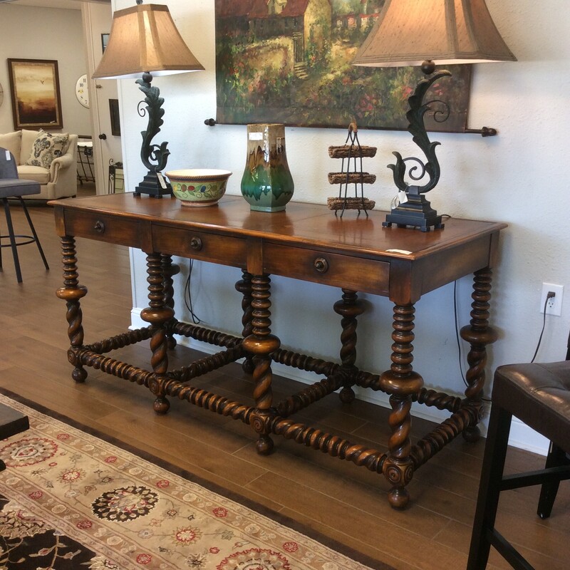This leather topped console table is a stunner! Large,  needs the appropriate sized room. The attention to detail and quality of craftsmanship is obvious.