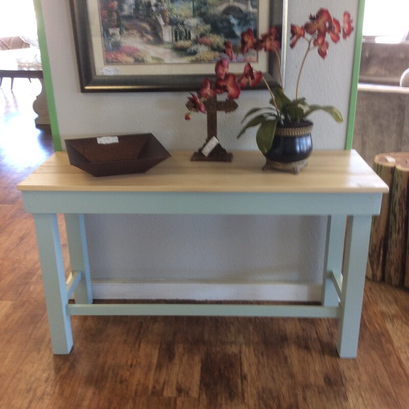 Painted light blue table with pine wood top.  Size: 50x18x29