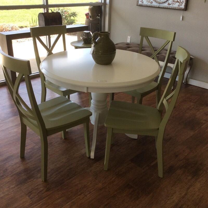 Charming country cottage style breakfast dining set makes it a welcoming choice for any dining are.  Made of solid wood with a white finish, and 4 green chairs.  Size: 41 X 31