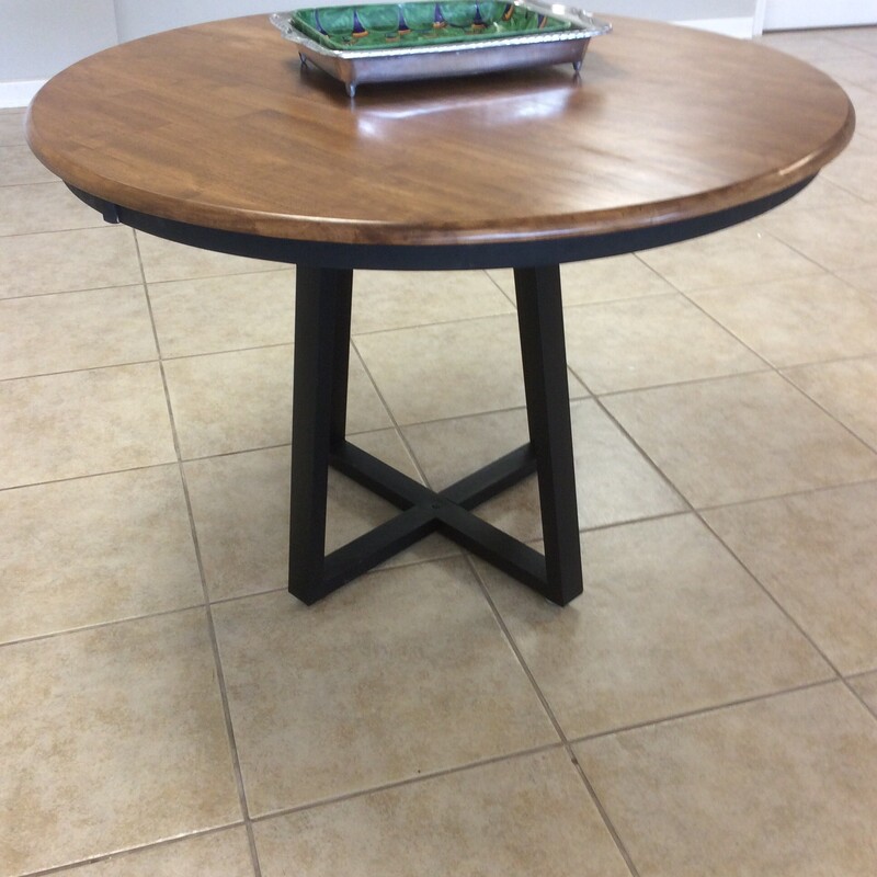 Wonderfully bold and rustic, the round dining table would be a fabulous centerpiece for any room.  Size: 42 RND X 30
