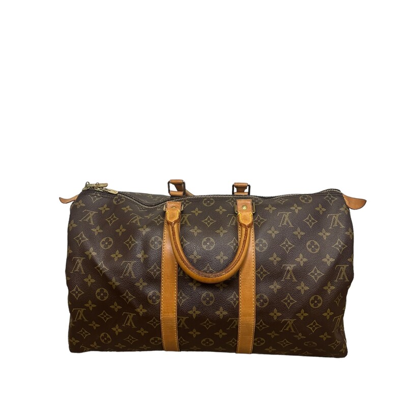 Louis Vuitton Keepall, Monogram, Size: 45
Lightweight and roomy, the Louis Vuitton Keepall Bandoulière 45 is the only way to travel in style. Its timeless shape and classic Monogram canvas are as fresh today as they ever have been.

17.7 x 10.6 x 7.9 inches
(length x Height x Width)
Monogram Canvas
Natural Cowhide Leather trimmings
Cotton Textile Lining
Good capacity
Cabin size
Removable leather name tag
