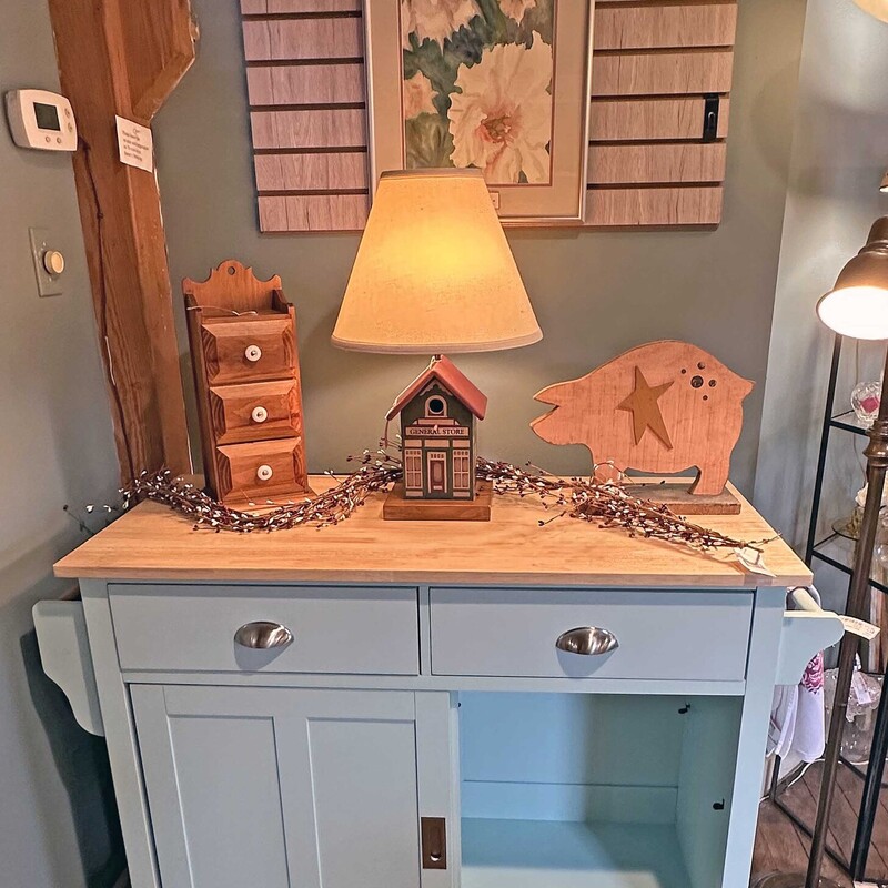 Blue Kitchen Island,<br />
 Size: 50x20x37<br />
Just arrived!!! Light teal blue kitchen island with 2 drawers, 2 sliding door cabinets with shelves, drop leaf (44x10), one towl bar, one spice rack and a butcher block like top  Great island to mix margaritas on!!