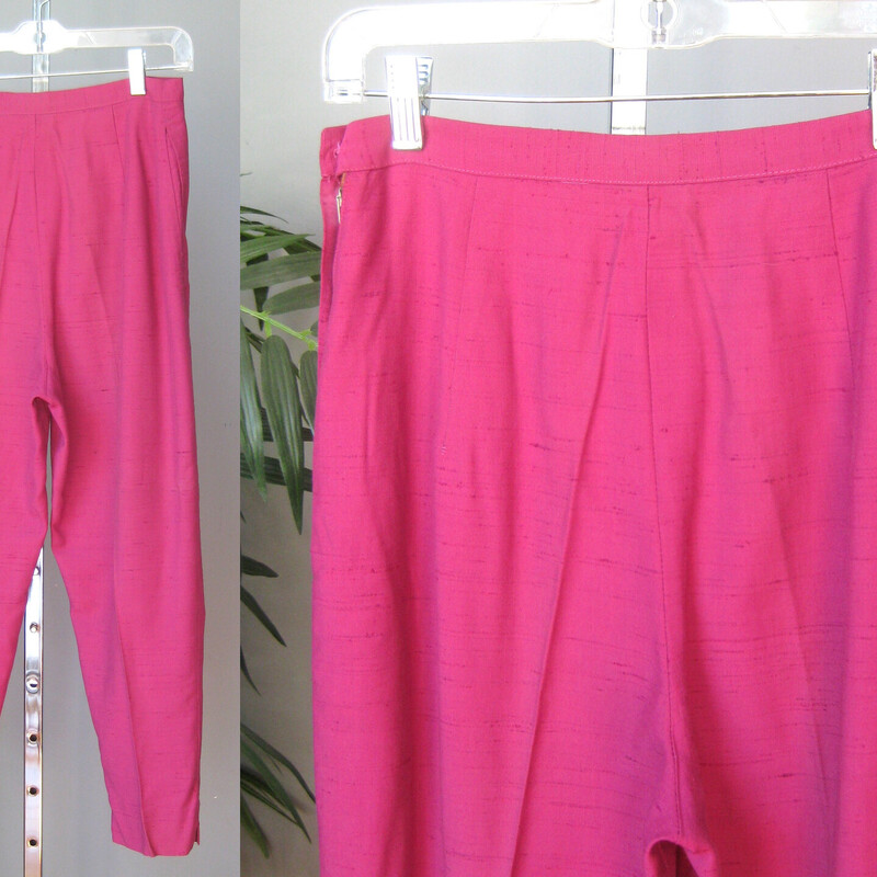 Super simple pink trousers from the 1950s or 60s in hot pink in a nubby shantung like fabric.
These are capri length, please check that the inseam works for you!
The pants have no labels as to brand or fabric or size.
Side Button and metal zipper
unlined

Excellent condition
flat measurements:
waist: 13.5
hip: 19
rise: 13.5
inseam: 23
side seam 35.5

thanks for looking!
#70448