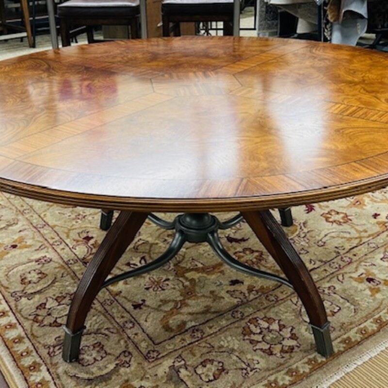 Thomasville Wood Round Dining Table
Brown Silver Size: 63 x 30.5H
Metal accents on base
