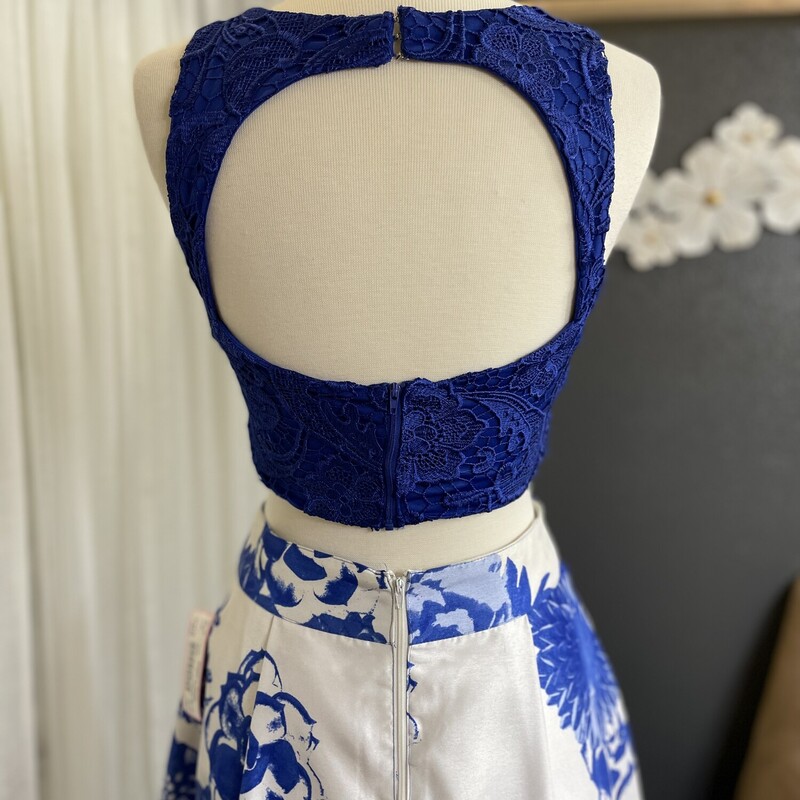 Sequin Hearts 2PC  Floral, Royal Blue and White ,<br />
Size: 5<br />
Beautiful  Dress for Prom or any Formal!<br />
All Sales Are Final. No Returns.<br />
Pick Up In Store Within 7 Days Of Purchase<br />
Or<br />
Have It Shipped<br />
<br />
Thank You For Shopping With Us  :-)