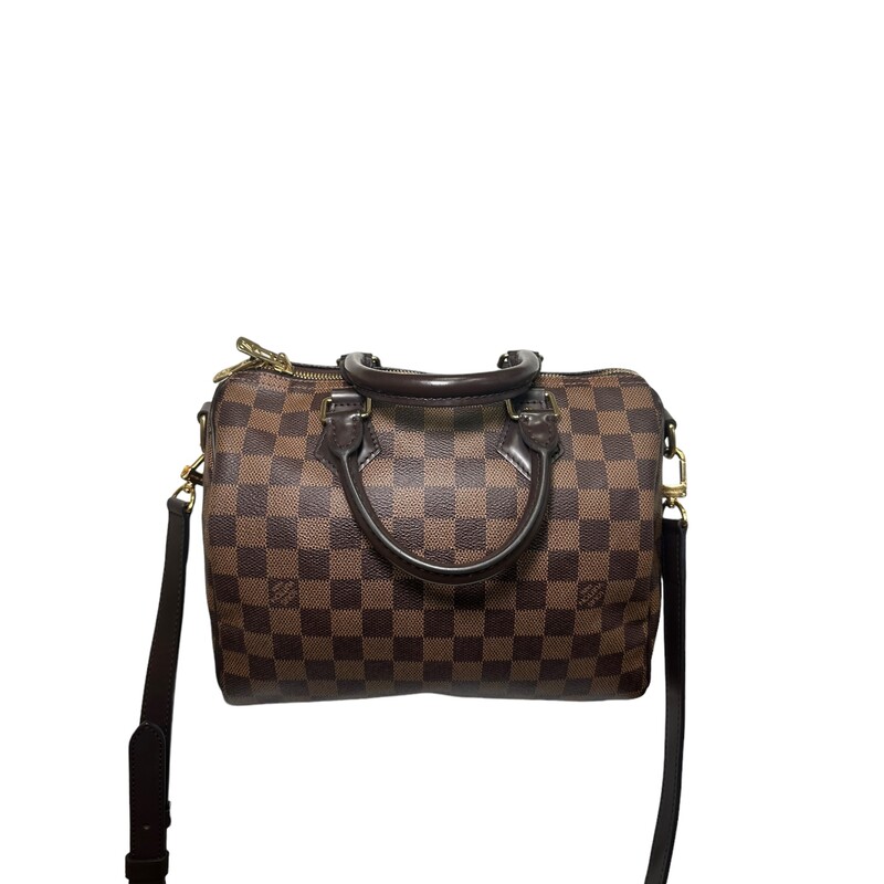 Louis Vuitton Speedy Bandoulière Ebene 25<br />
<br />
Dimensions:<br />
9.8 x 7.5 x 5.9 inches<br />
(length x Height x Width)<br />
<br />
DAte Code: SD2119<br />
<br />
The Speedy Bandoulière 25 in signature Monogram canvas is an ideal city bag for every day. Originally created for travelers in the 1930s – the name refers to the era’s rapid transit – every feature of the Speedy’s design is iconic, from its unmistakable shape to the rolled leather handles, engraved padlock and detachable strap.