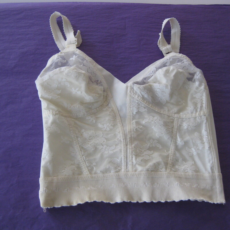 Vtg Lace Longline Bra, Ivory, Size: 34D<br />
Structured White full coverage long line bra.<br />
Excellent condition with strong control and lace details<br />
marked size 34D<br />
The Band and back have lots of strong stretch.<br />
Union Label<br />
The band measures only 24 from end to end but I think this is correct.  It is quite tight on my dress form which is a perfec moder size 4.<br />
<br />
thanks for looking!<br />
#70420