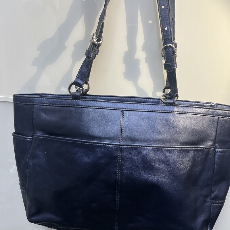 Brand NEW condition!! 17722 Leather Metallic Bag, Blue with silver hardware and grey lining.