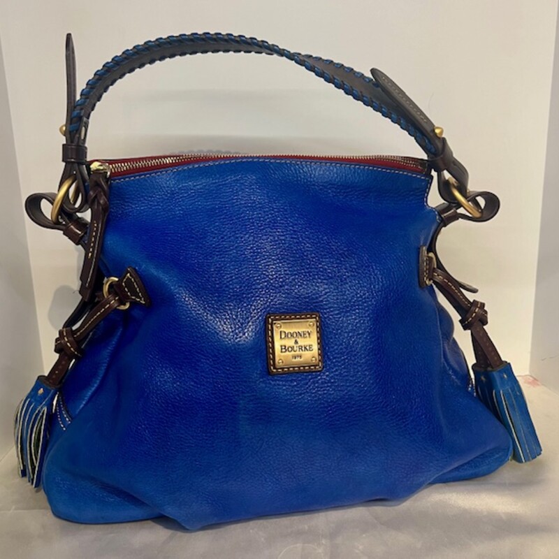 Dooney&Bourke Toledo Handbag
AS IS- normal ware
Royal blue and brown
Size: 14x11H