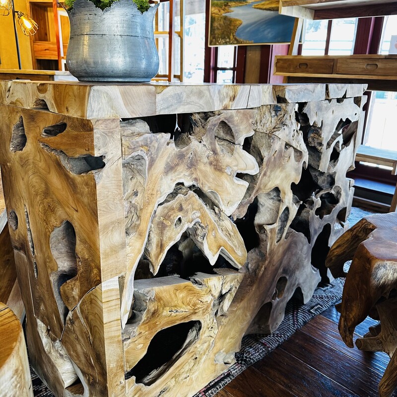 Teak Root Console

Size: 47Wx16Dx31H

A Part of the Solution
Tropical Salvage positions business to assist in tropical forest conservation, climate change mitigation and environmental education, Tropical Salvage uses the marketplace to drive positive change.

We build furniture and homewares to last for generations, Tropical Salvage offers people a choice to buy extraordinary expressions of nature’s art and support tropical forest conservation.