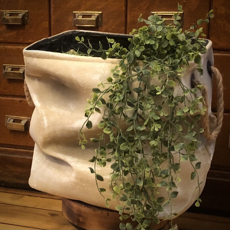 Introducing the Ceramic Slouch Planter - the epitome of urban chic and a must-have for every trendsetter's green oasis! This planter isn't just for your leafy buddies; it's a bold statement piece that marries raw industrial vibes with modern elegance. Super cool piece, looks like fabric but is actually a full working ceramic planter!
14 H x 15 L x 10 D
