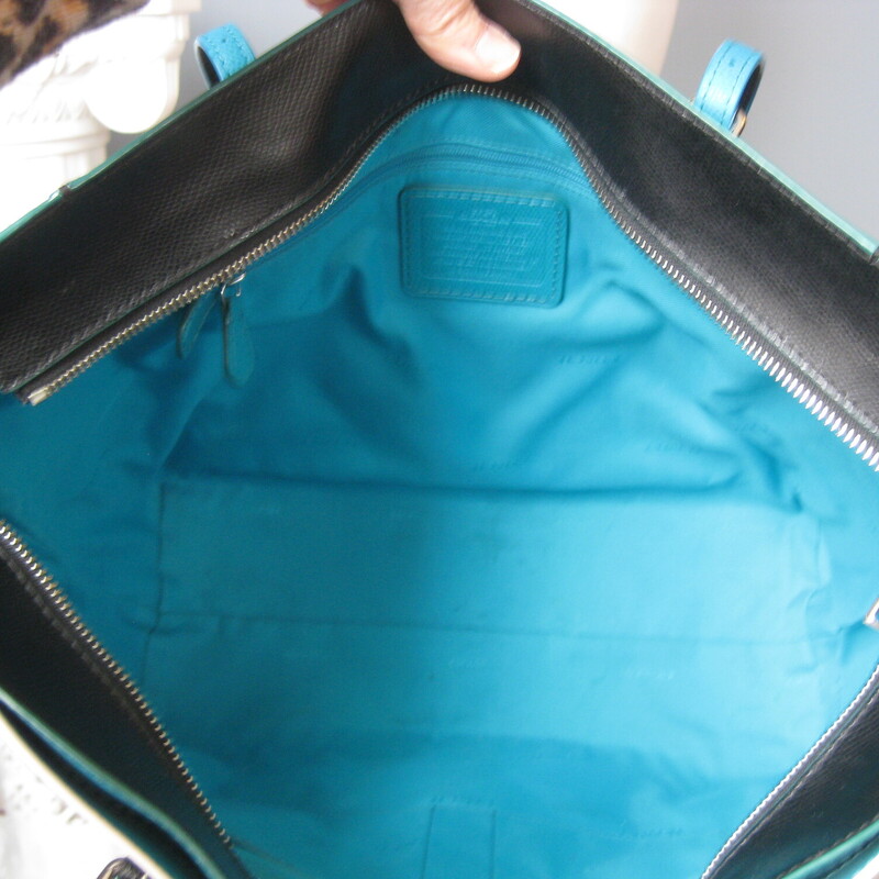 Coach Pebbled Tote, Black, Size: None
Coach Edgestain black carryall tote in black pebble leather with teal accents and teal interior.
top zipper
big side pocket
2 slip and one zip pocket inside
No C1657-38323
great condition with a touch of darkening of the white edges and a white mark on the outside.  Pls see all the photos.

12.5 wide at bottom, 18 wide at the top
11.5 tall
6 deep
handle drop: 9.5

thanks for looking!
#71500