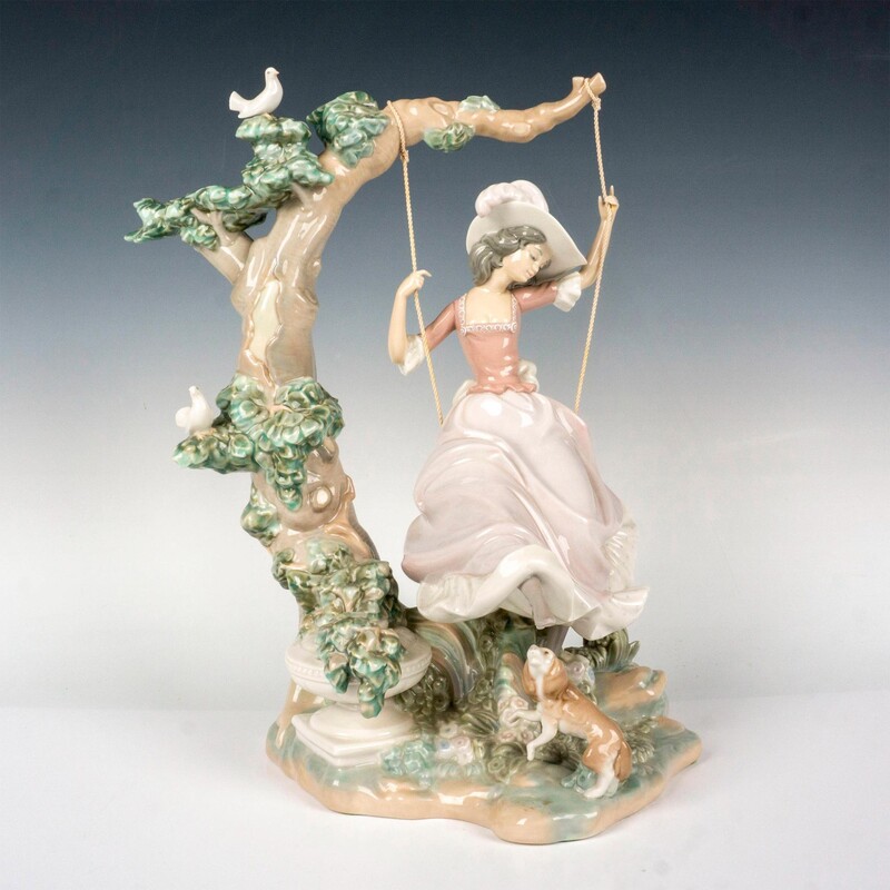Lladro Victorian Girl on Swing
Pink Green Gray Brown
Size: 12 x 9 x16H
