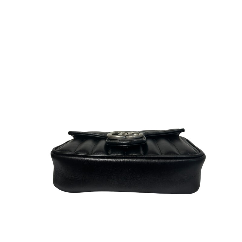 Gucci Marmont Shoulder, Black, Size: Super Mini<br />
<br />
Dimensions:<br />
Length: 6.5 in<br />
Height: 4.25 in<br />
Width: 7.75 in<br />
Drop: 23 in<br />
<br />
This is an authentic Gucci Calfskin Matelasse Aria Super Mini GG Marmont Shoulder Bag in Black. This shoulder bag is crafted of black calfskin leather. This crossbody bag features an aged silver chain shoulder strap. The front crossover flap features an aged silver GG logo that opens to a light beige suede interior.