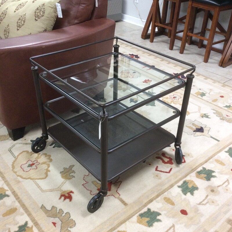 Originally from Pottery Barn, this serving cart has a urban, industrial feel. A lovely combination of metal and glass, it's 3-tiered and sits on casters for easy  portability.