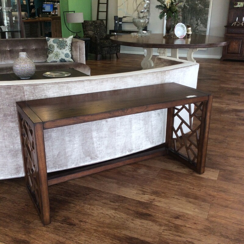 This is a very nice credenza table. It has a dark wood finish with just a touch of distressing.
