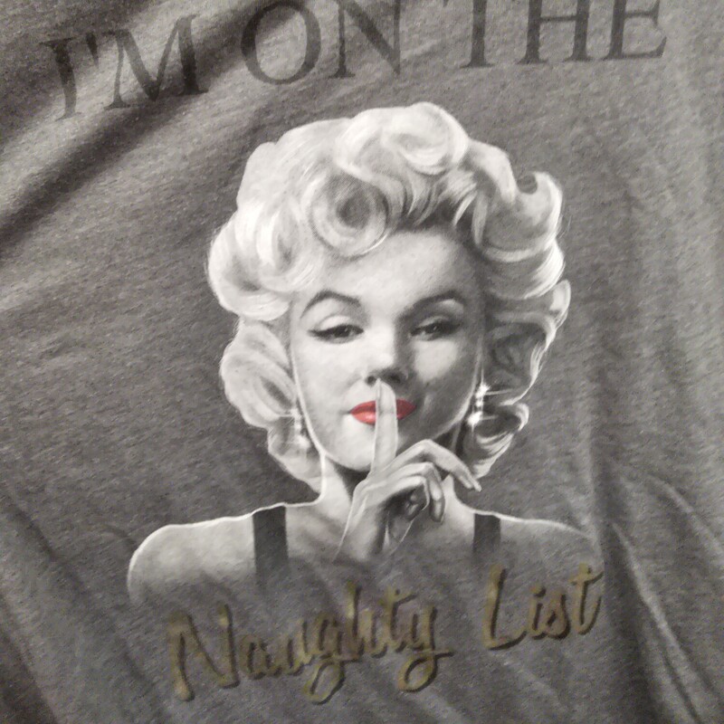 Grey short sleeve tee with I am on the Naughty list graphic