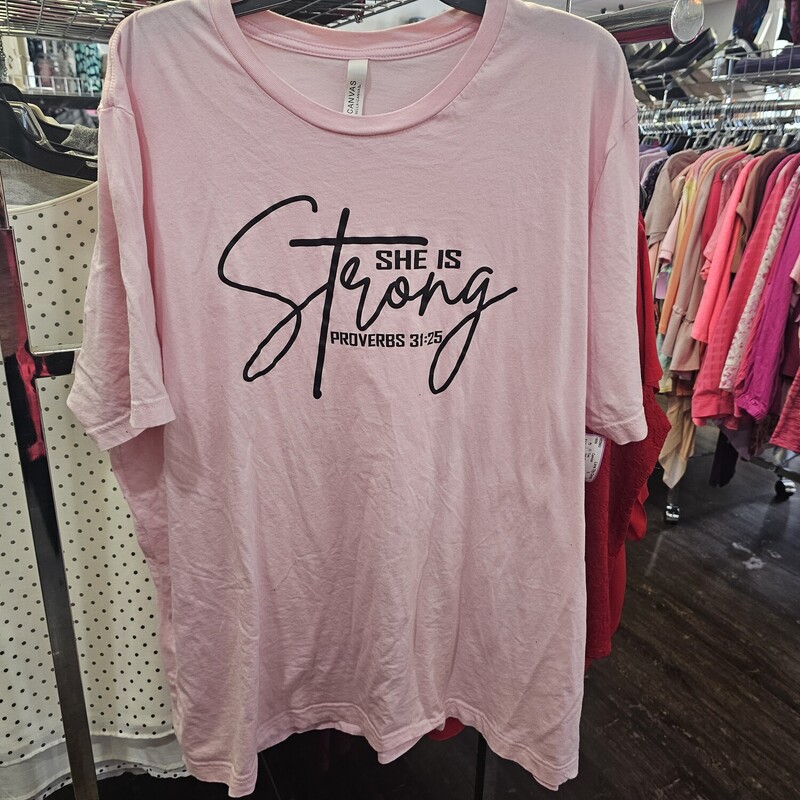 Pink tee with She is strong graphic