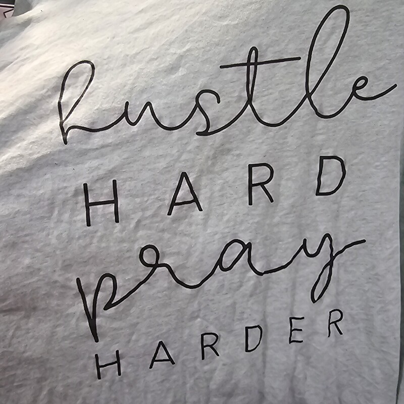 Mint green tee with Hustle Hard Pray Harder graphic.
