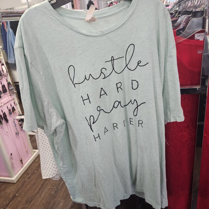 Mint green tee with Hustle Hard Pray Harder graphic.